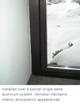 Installed over a typical single pane aluminum system, iWindow maintains interior and exterior appearances.